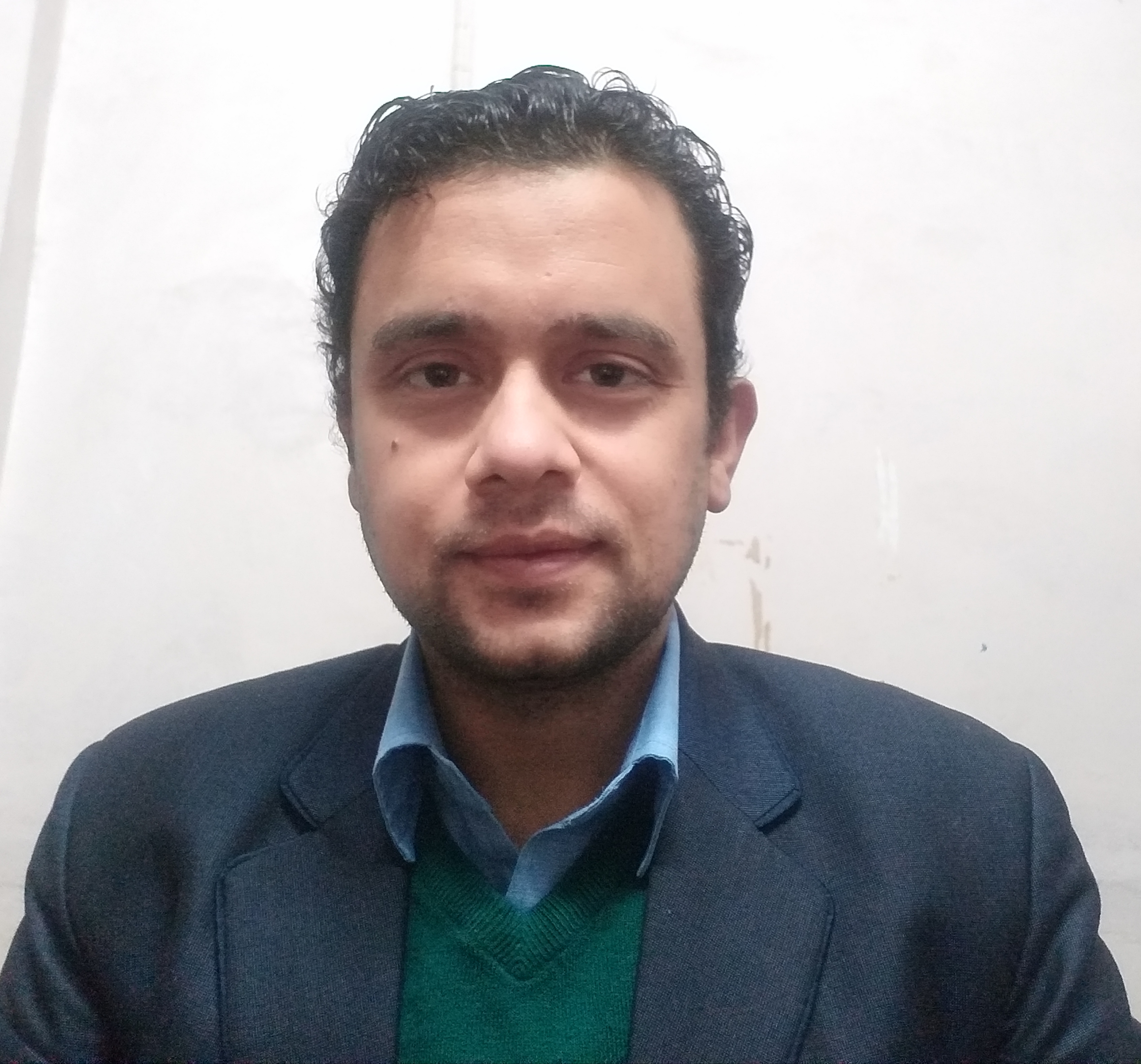 Dr. Anuj Tewari